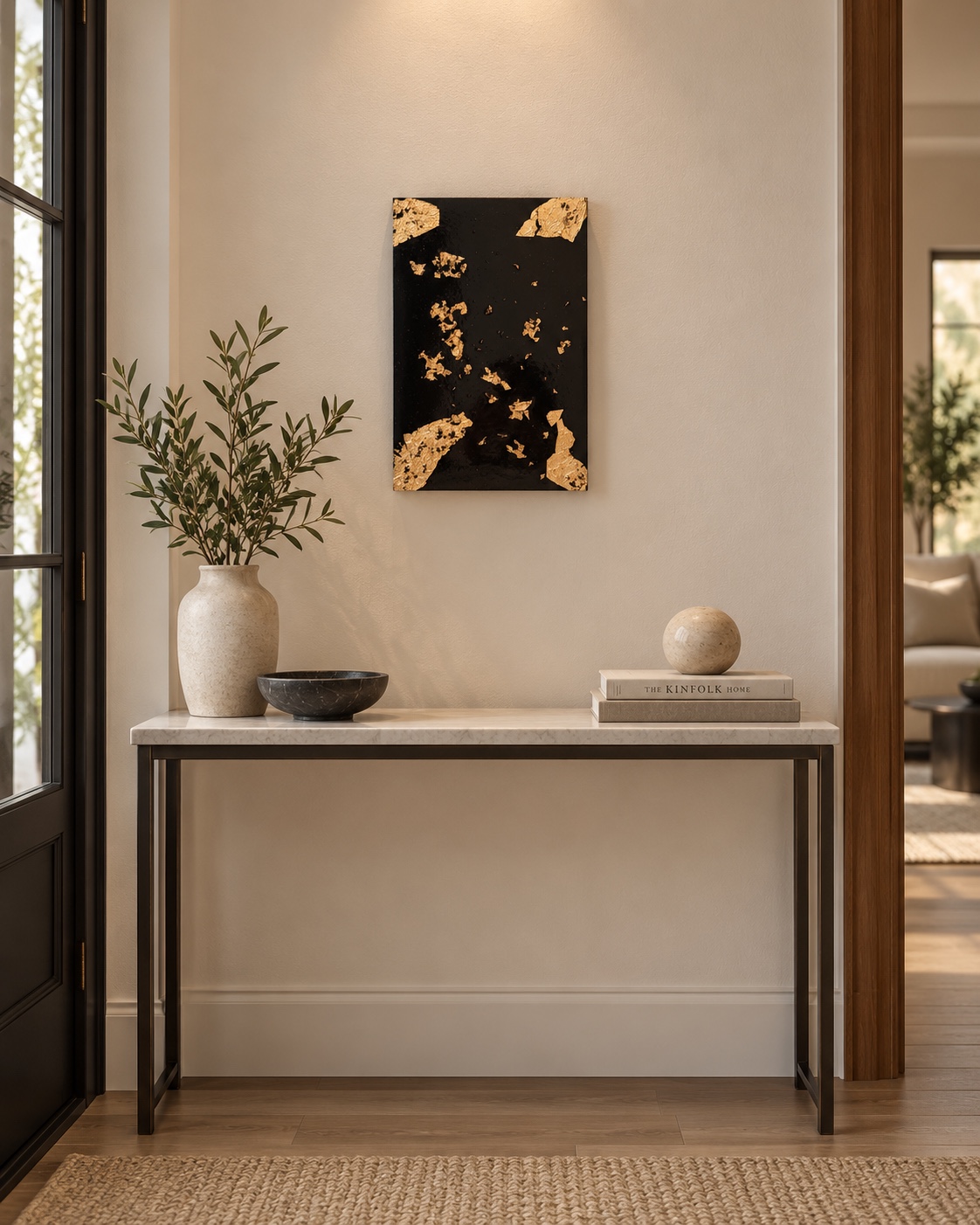 Gilded Silence displayed above a slim entryway console